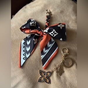 Elegant Black and Orange Keychain with Bow